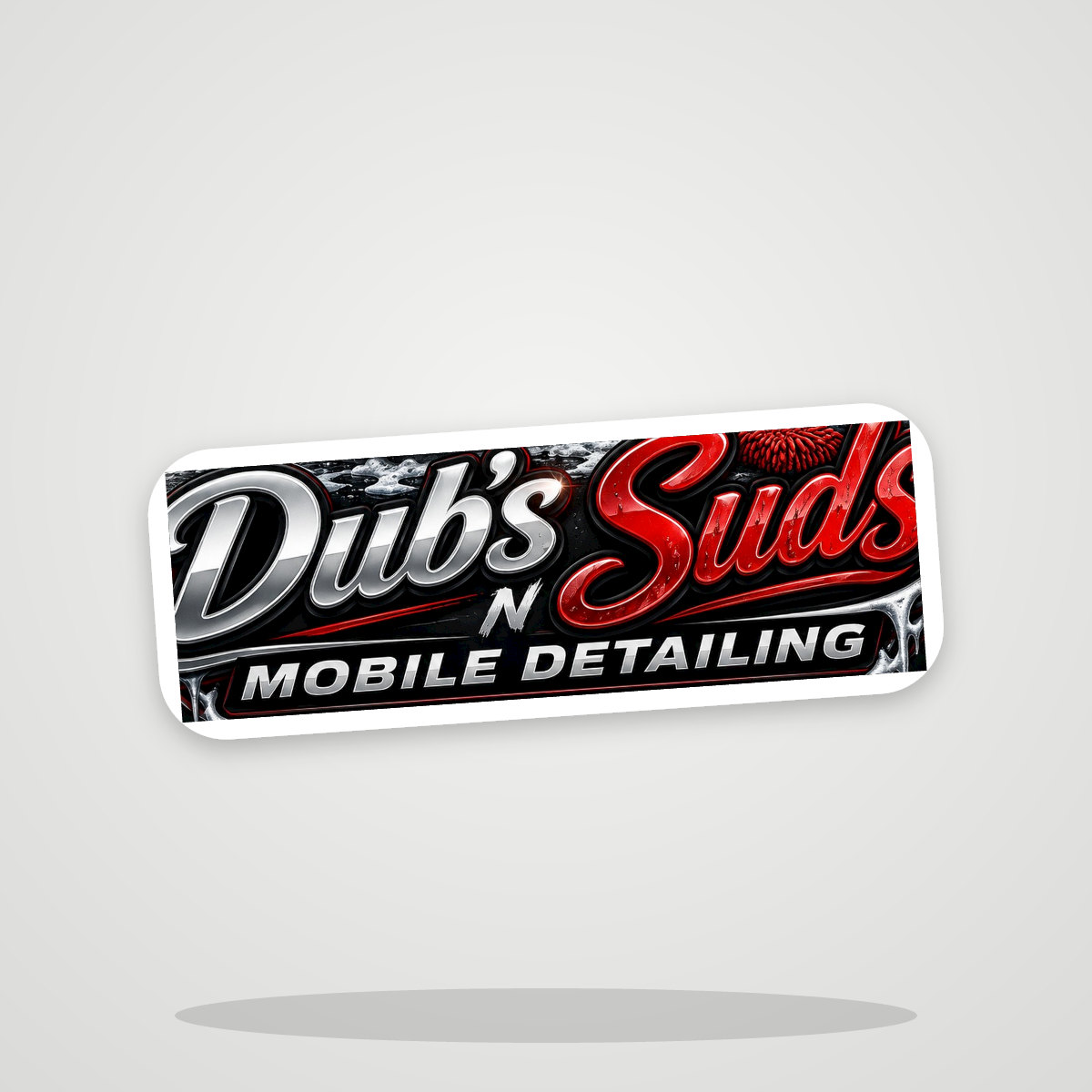 Die-cut vinyl sticker of the Dub's N Suds Mobile Detailing wordmark with a white border